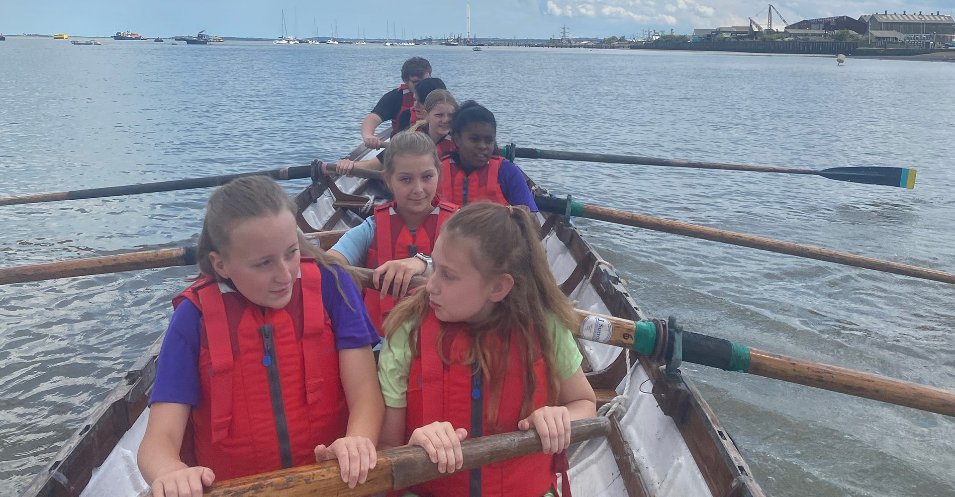 London Youth Rowing participants rowing on the Thames