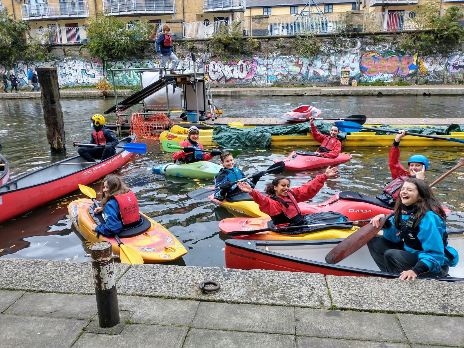 Children on the water at Pirate Castle in kayaks