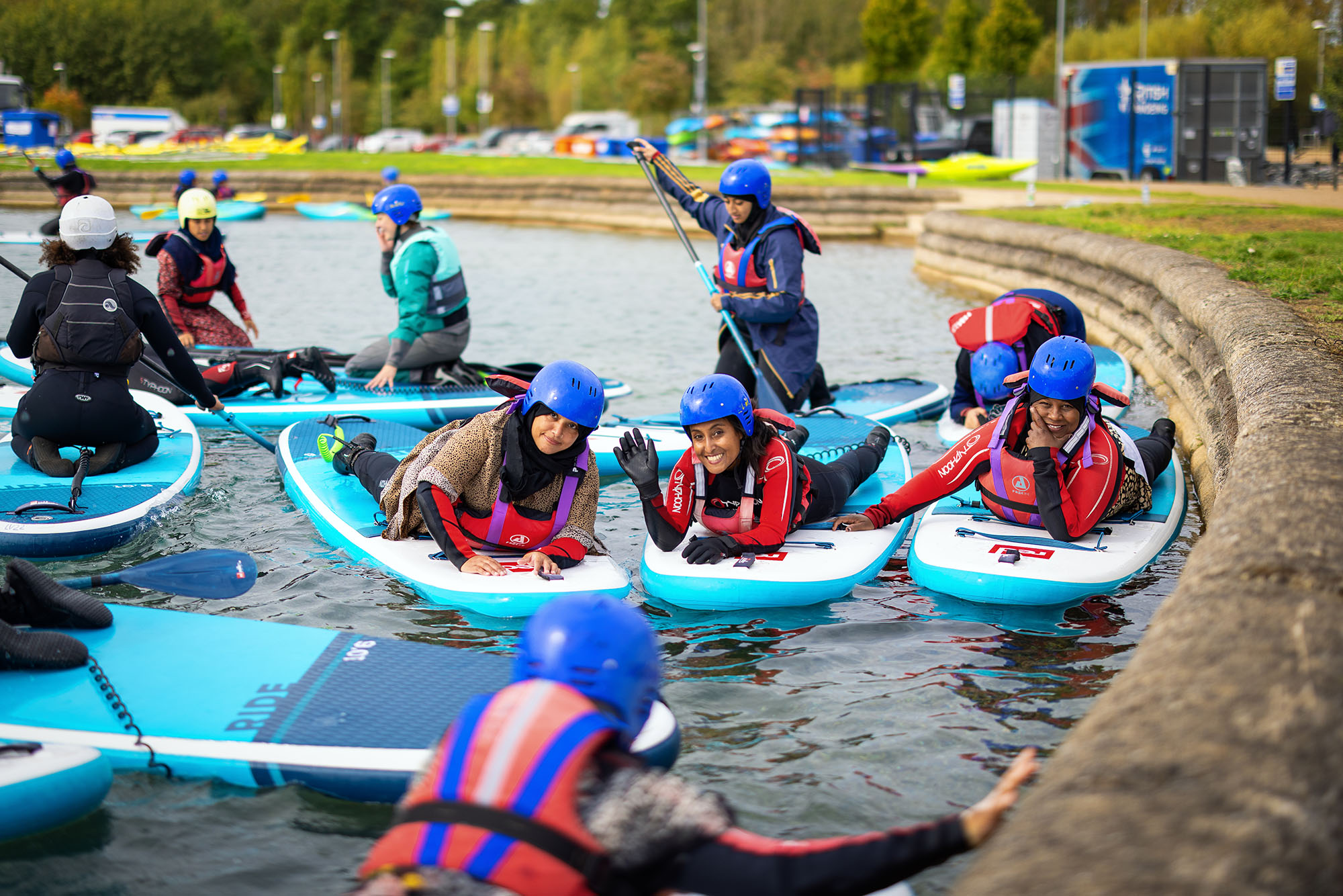 Women paddleboarding at Poplar HARCA