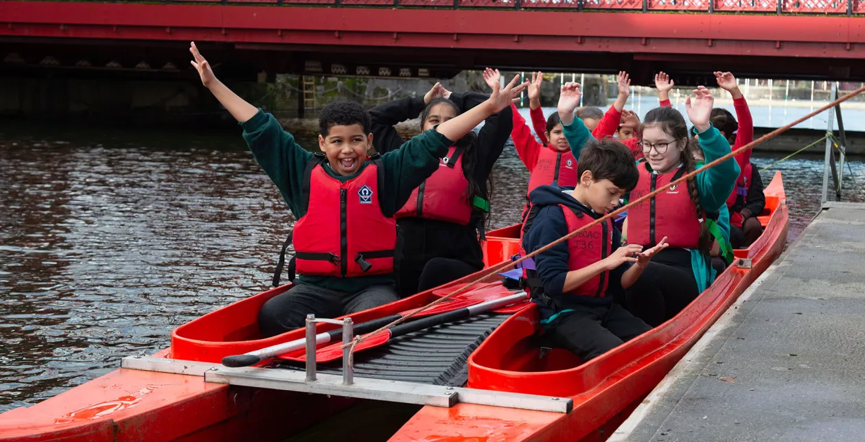 Children in duo-boats at Shadwell Basin