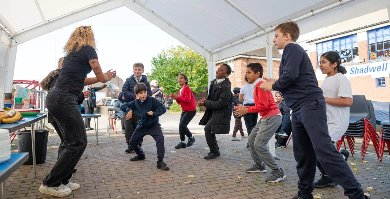 Children dancing at Shadwell Basin