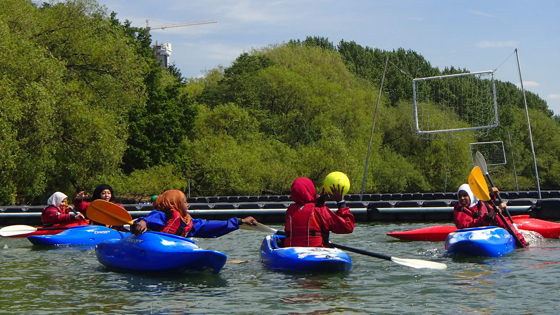 Phoenix Canoe Club participants playing polo in canoes in 2022